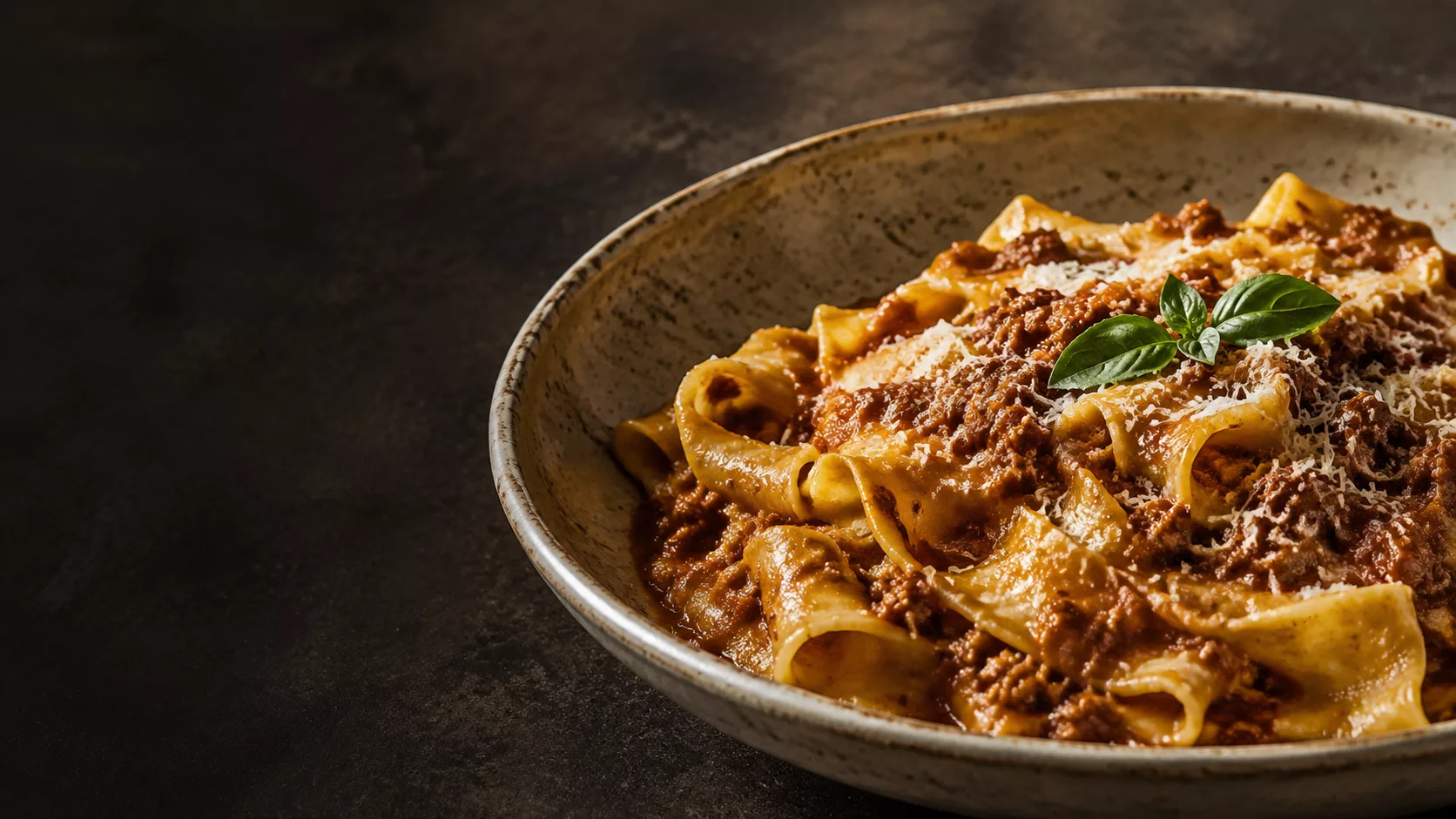 Pappardelle coated in a rich ragù